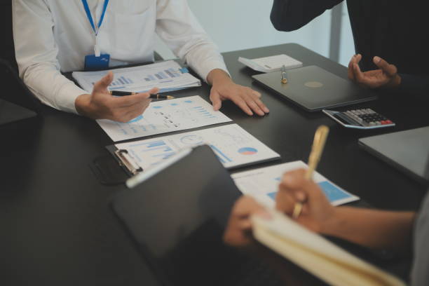 istock Business team collaboration discussing working analyzing with financial data and marketing growth report graph in team, presentation and brainstorming to strategy planning making profit of company. 2119842777