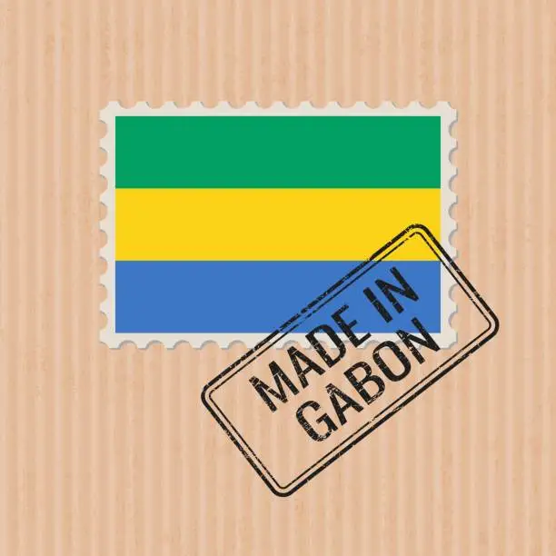 Vector illustration of Made in Gabon badge vector. Sticker with Gabon national flag. Ink stamp isolated on paper background.