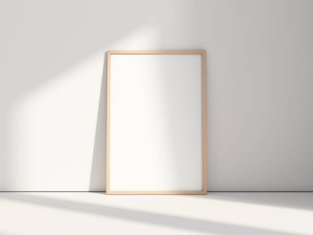 istock Vertical wooden poster Frame Mockup on floor in white room 2119855994