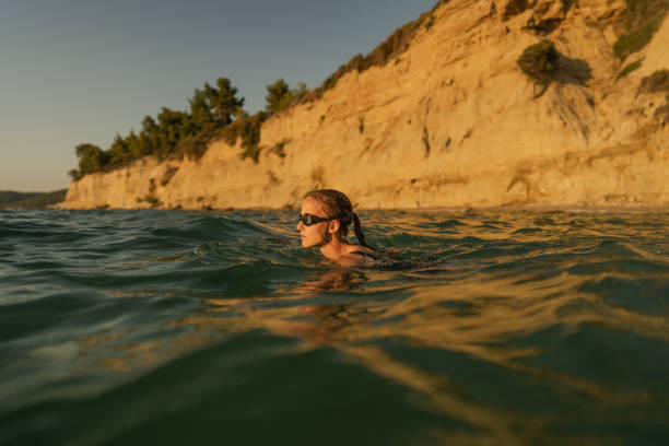 istock Portrait of a determined athlete while swimming 2119871103