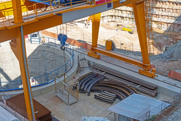 istock Metal crane for installing a frame into an excavated subway tunnel. 2119875976