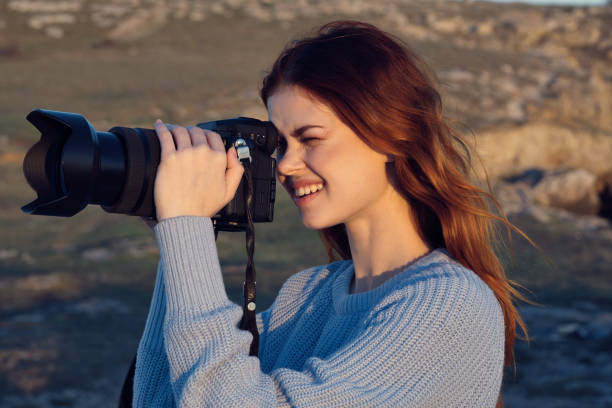 istock woman professional photographer outdoors hobby work landscape 2119877065