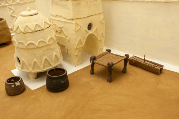 istock A white and brown pottery oven sits on a brown floor 2119886335