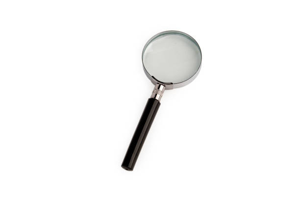 istock A magnifying glass with a black handle lying on a white background 2119891837
