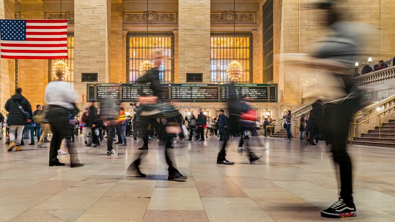 Time lapse Crowd of Passenger and tourist walking and transiting in commuter rail terminal Grand Central Station in Midtown Manhattan, New York City, United States