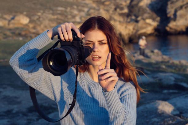 istock pretty woman who is outdoors nature vacation professional 2119923259