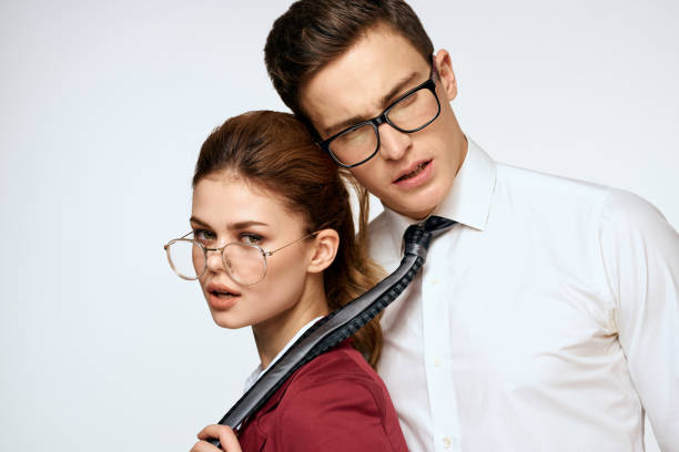 istock man and woman work colleagues officials communication light background 2119953213