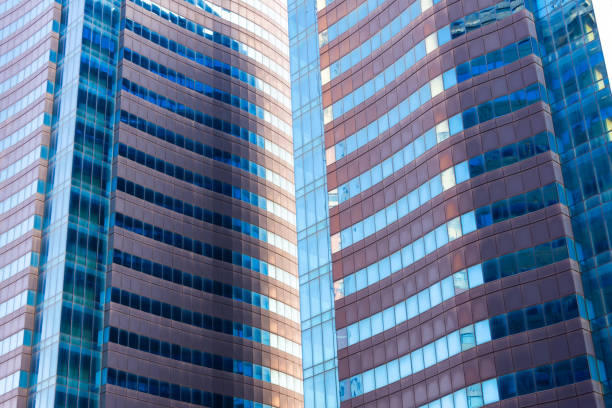 istock Facade with reflections light and shadow blue shades in an urban landscape. 2119957017