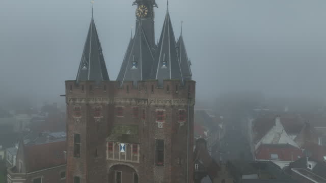 Zwolle Sassenpoort during a misty fall day