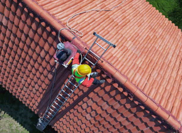 istock Worker doing roof repair with safety. 2120009505