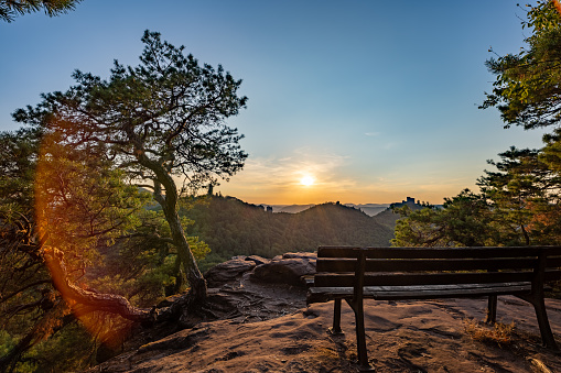 Bench on Rock Slevogtfelsen with View of Trifels Castle during Sunset, Rhineland-Palatinate, Germany