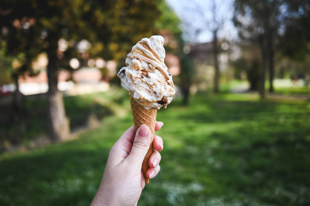 istock Tasty Caramel ice-cream cone. 2120118624