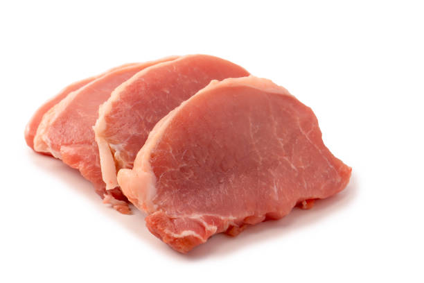 istock Raw pork pieces isolated on a white background. 2120133346