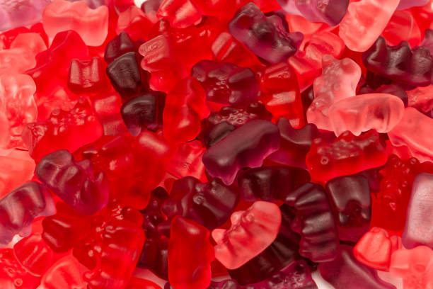 istock Assorted red gummy candies. Jelly bears. 2120133887