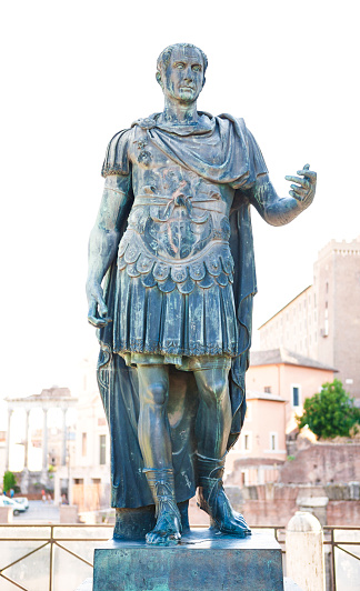 Statue of Roman Emperor Julius Caesar at Roman Forum, Rome, Italy. Black and white image.