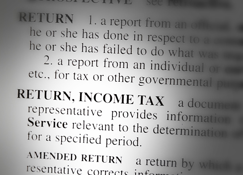 close up photo of the words income tax return