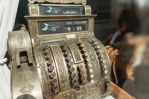 Vintage retro metal typewriter with buttons. Retro tally machine