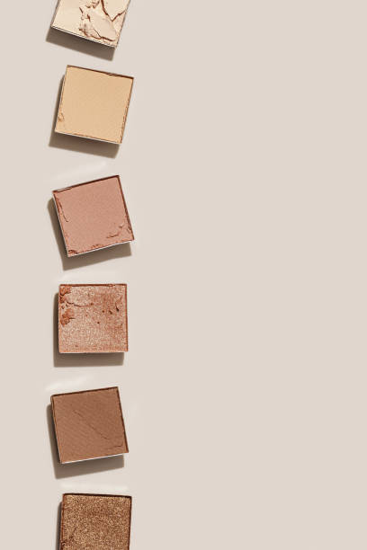 istock Beauty product neutral colored eyeshadows for makeup, beige monochrome pattern with copy space, minimal flat lay with nude colors swatches eyeshade, cosmetic texture, beige color palette 2120234800