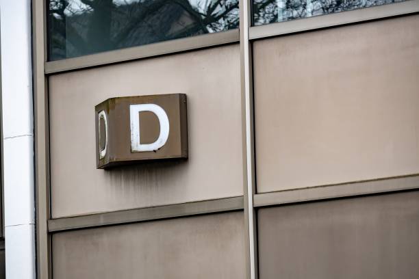 istock the letter D on an old industrial building 2120330026