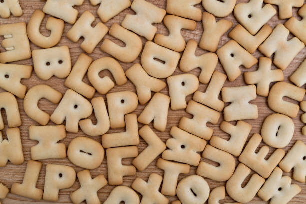 Heap of letter biscuits on the table.