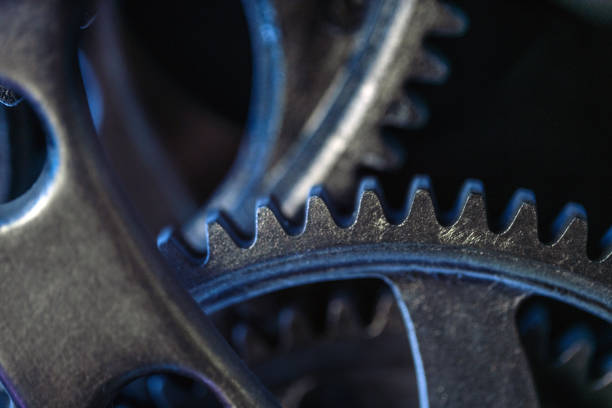 Metal cogwheels on white background