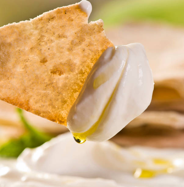 istock Dry curd bread on Arab food consumption scene 2120364009