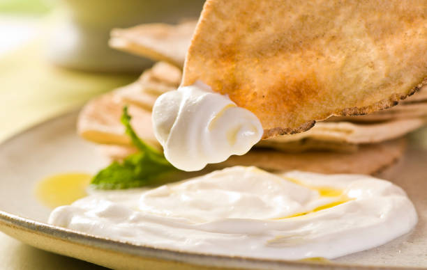 istock Dry curd bread on Arab food consumption scene 2120367724