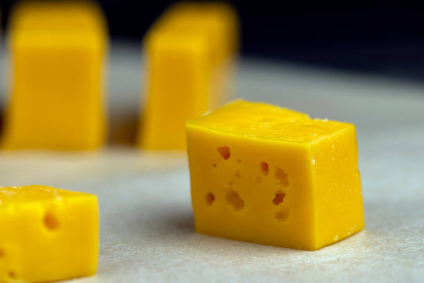 sliced orange cheese made from cow's milk, high-quality long-aged orange cheese made from milk