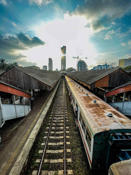 istock Sun set among buildings 2120411759