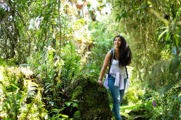 istock Latin woman in the forest 2120414887
