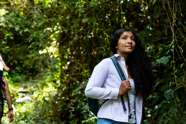 istock Latin woman in the forest 2120416968