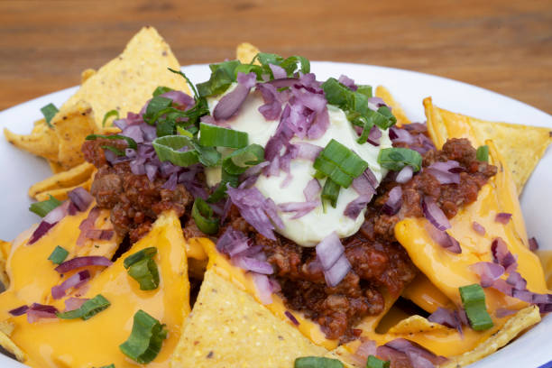 istock Gourmet nachos with avocado cream 2120471802