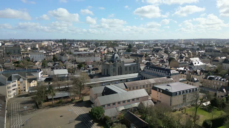 Institution Immaculée Conception school at Laval, France. Aerial drone panoramic view and sky for copy space