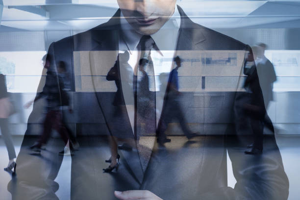 Man standing in a crowded city environment