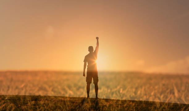 istock Strong confident man at sunset. Winner, success. 2120555918