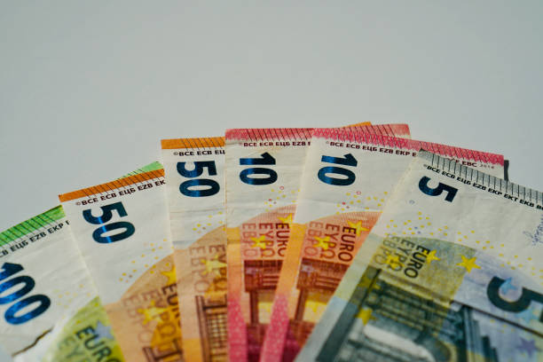 istock euro banknotes and coins 2120570570