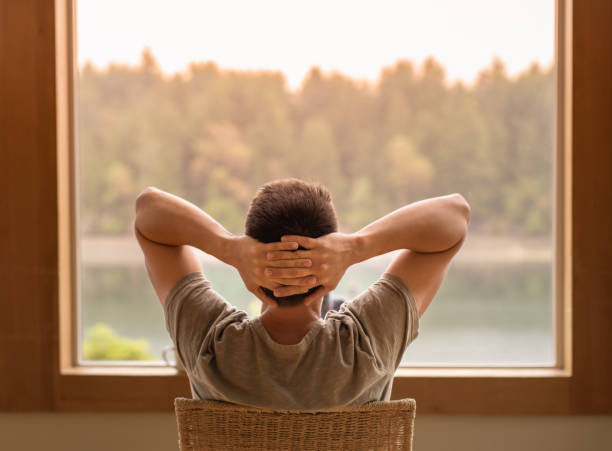 istock Sit back relax at home look out window 2120600957
