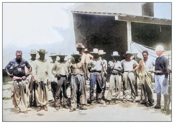 istock Antique black and white photograph: Group of captured bandits, Cuba 2120622344