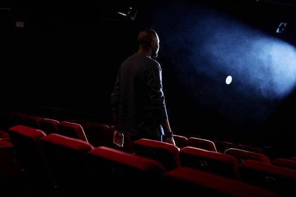 istock Artist Walking Towards Stage in Theater 2120719927