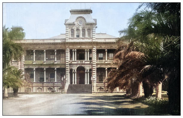 Antique black and white photograph of people from islands in the Caribbean and in the Pacific Ocean; Cuba, Hawaii, Philippines and others: King's Palace, Honolulu, Hawaii