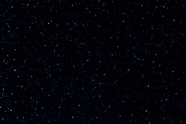 istock Starry night sky. Glowing stars in space. Galaxy space background. 2120725481