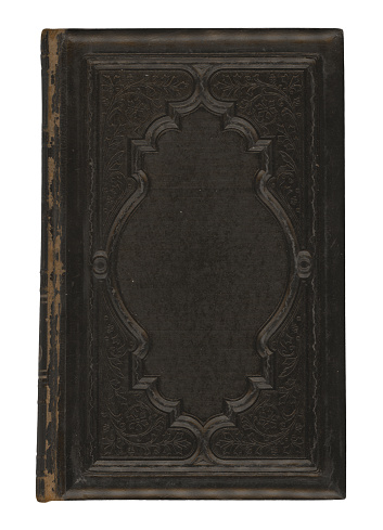 Antique ornate black hardcover book.