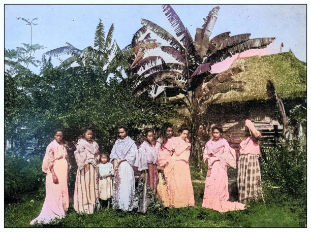 Antique black and white photograph of people from islands in the Caribbean and in the Pacific Ocean; Cuba, Hawaii, Philippines and others: Women, Manila, Philippines