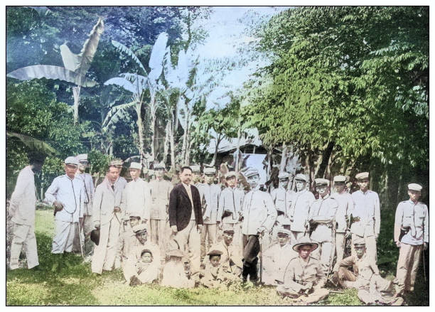 Antique black and white photograph of people from islands in the Caribbean and in the Pacific Ocean; Cuba, Hawaii, Philippines and others: Aguinaldo's officers, Philippines