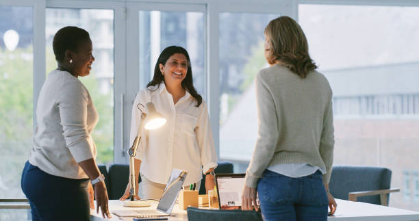 istock Professional women, meeting and teamwork for planning, collaboration or brainstorming on creative project. Group of people or employees in public relations for business ideas on computer and tablet 2120741065