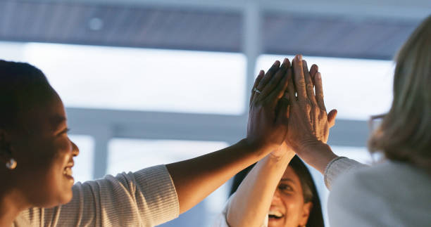 istock Night, celebration and business people with office high five for sales, target or collaboration success closeup. Startup, winner and hands or women coworkers in solidarity, motivation or support 2120745313
