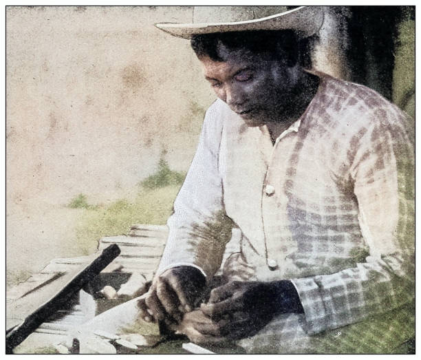 istock Antique black and white photograph: Filipino carpenter at work 2120784855