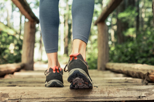 istock Person walking in nature park setting 2120792210
