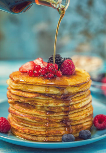 istock Homemade Pancakes with Berries and Maple Syrup 2120792229