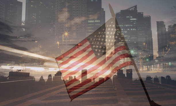 Double exposure of United States flag on city background